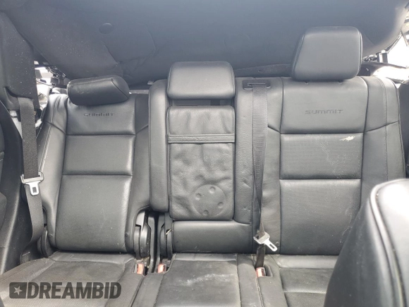 2015 Jeep Grand Cherokee Summit with VIN 1C4RJFJG2FC913658, listed as a Copart auction lot 52160035 with 138,008 mi miles and Salvage Title. Bid and sale history available at DreamBid. Image 10.
