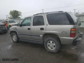 2001 Chevrolet Tahoe LT with VIN 1GNEC13T51R197521, listed as a Copart auction lot 51053265 with 319,590 mi miles and Salvage Title. Bid and sale history available at carsss.com. Image 2.