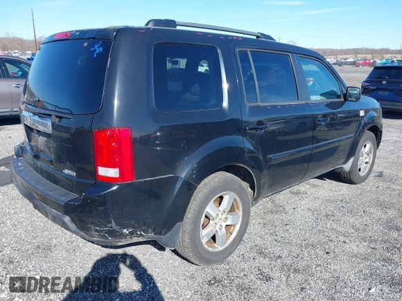 2011 Honda Pilot EX-L with VIN 5FNYF4H65BB004213, listed as a IAAI auction lot 41867681 with 157,644 mi miles and . Bid and sale history available at carsss.com. Image 4.