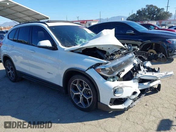 2016 BMW X1 xDrive28i z VIN WBXHT3C32G5E51855, wystawiony jako IAAI lot #41634237 z przebiegiem 69 101 mil mil oraz . Historia ofert i sprzedaży dostępna na DreamBid. Obrazek 1.