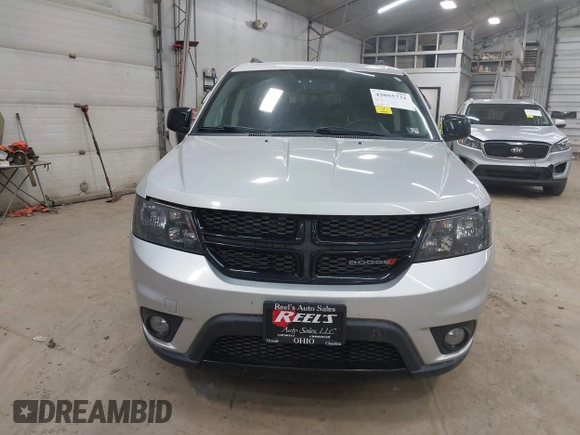2013 Dodge Journey SXT with VIN 3C4PDCBBXDT661479, listed as a IAAI auction lot 42055731 with 151,963 mi miles. Bid and sale history available at carsss.com. Image 6.