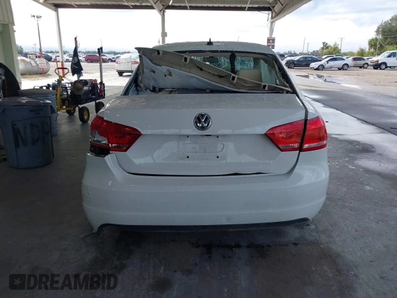 2015 Volkswagen Passat 1.8T Limited Edition with VIN 1VWAT7A3XFC100852, listed as a IAAI auction lot 41204902 with 85,725 mi miles. Bid and sale history available at carsss.com. Image 16.