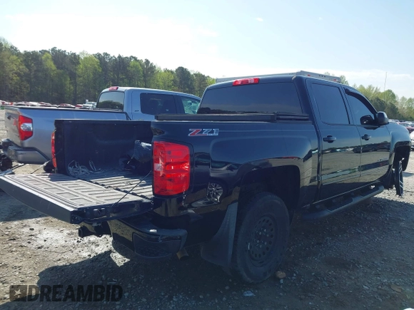 2017 Chevrolet Silverado 1500 LT with VIN 3GCUKREC4HG310842, listed as a IAAI auction lot 41908001 with 179,814 mi miles and . Bid and sale history available at DreamBid. Image 4.