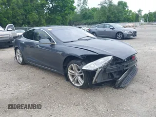 2014 Tesla Model S 60 with VIN 5YJSA1H17EFP62243, listed as a IAAI auction lot 42491966 with 193,021 mi miles and . Bid and sale history available at DreamBid. Image 1.