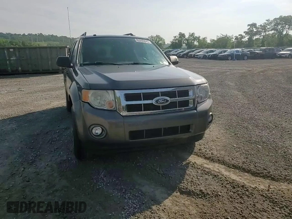 2012 Ford Escape XLT z VIN 1FMCU9DG8CKA93402, wystawiony jako Copart lot #62266845 z przebiegiem 196 779 mil mil oraz Szkoda całkowita • Salvage title. Historia ofert i sprzedaży dostępna na DreamBid. Obrazek 14.