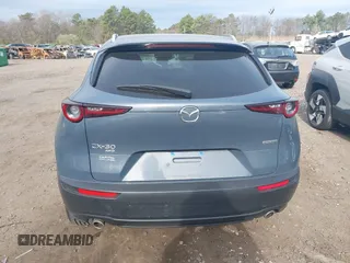 2023 Mazda CX-30 S Carbon Edition with VIN 3MVDMBCM8PM502891, listed as a IAAI auction lot 42050533 with 20,035 mi miles and . Bid and sale history available at DreamBid. Image 16.