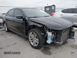 2019 Volkswagen Passat 2.0T Wolfsburg Edition with VIN 1VWLA7A36KC007173, listed as a IAAI auction lot 41357381 with 79,356 mi miles. Bid and sale history available at carsss.com. Image 1.