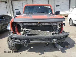 2023 Ford Bronco Raptor with VIN 1FMEE5JRXPLB07725, listed as a Copart auction lot 48746035 with 52,813 mi miles and Salvage Title. Bid and sale history available at DreamBid. Image 5.