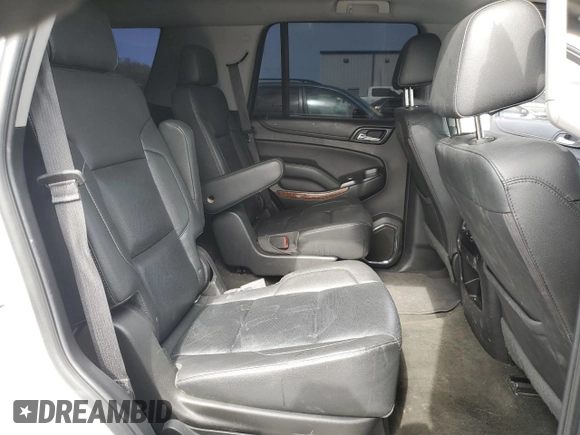 2018 Chevrolet Tahoe Premier with VIN 1GNSKCKC6JR195246, listed as a Copart auction lot 54887165 with 135,973 mi miles and Salvage title. Bid and sale history available at DreamBid. Image 11.