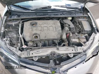 2018 Toyota Corolla L z VIN 5YFBURHE1JP855556, wystawiony jako IAAI lot #42273685 z przebiegiem 165 792 mil mil oraz . Historia ofert i sprzedaży dostępna na DreamBid. Obrazek 10.
