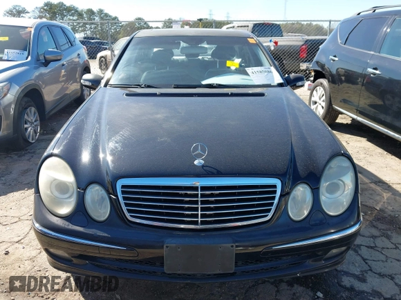 2005 Mercedes-Benz E-Class 3.2L with VIN WDBUF65J85A700806, listed as a IAAI auction lot 41585086 with 200,245 mi miles. Bid and sale history available at carsss.com. Image 12.