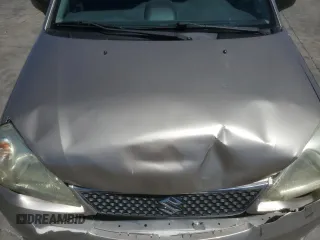 2006 Suzuki Aerio Premium z VIN JS2RA62S165300427, wystawiony jako Copart lot #57363605 z przebiegiem 141 824 mil mil oraz Szkoda całkowita • Salvage title. Historia ofert i sprzedaży dostępna na DreamBid. Obrazek 11.