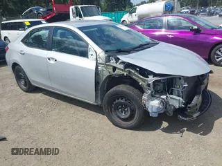 2016 Toyota Corolla L z VIN 2T1BURHE0GC659066, wystawiony jako IAAI lot #42249074 z przebiegiem 84 203 mil mil oraz . Historia ofert i sprzedaży dostępna na DreamBid. Obrazek 1.