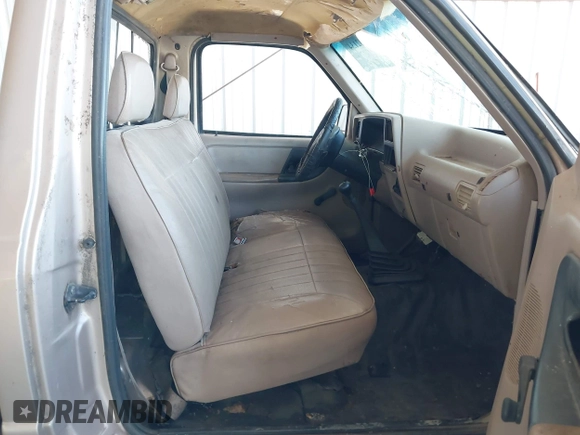 1994 Ford Ranger Splash z VIN 1FTCR10A5RUE28850, wystawiony jako IAAI lot #41882134 z przebiegiem 186 104 mil mil oraz . Historia ofert i sprzedaży dostępna na DreamBid. Obrazek 5.