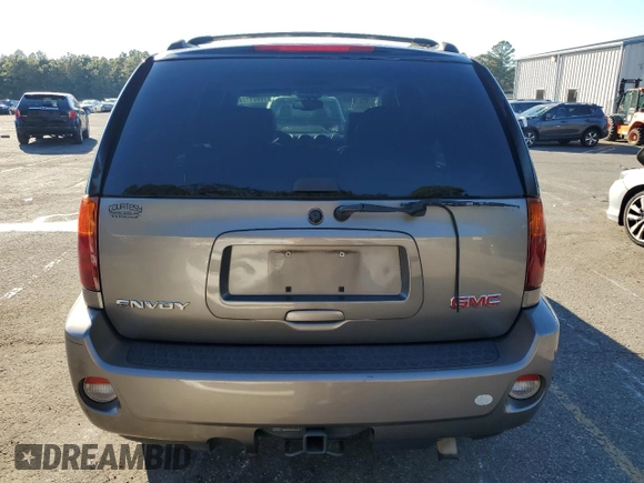 2006 GMC Envoy Denali with VIN 1GKES63M962257466, listed as a Copart auction lot 76821124 with 171,266 mi miles and Salvage Title. Bid and sale history available at carsss.com. Image 6.