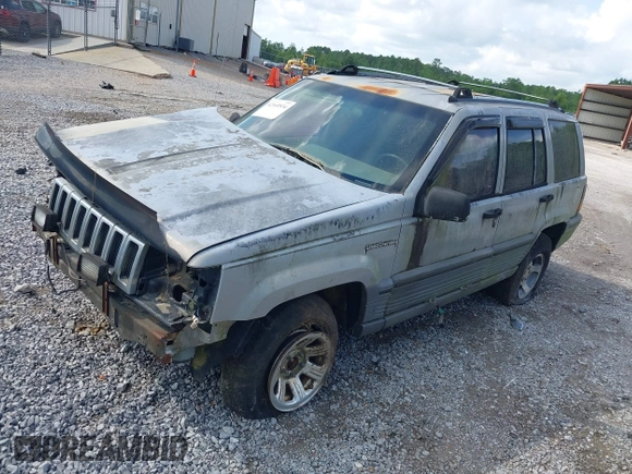 1995 Jeep Grand Cherokee Laredo with VIN 1J4GZ58S6SC756256, listed as a IAAI auction lot 42169534 with 255,516 mi miles. Bid and sale history available at carsss.com. Image 2.
