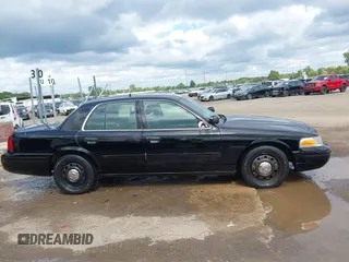 2005 Ford Police Interceptor z VIN 2FAHP71WX5X154384, wystawiony jako IAAI lot #40735796 z przebiegiem 84 143 mil mil oraz . Historia ofert i sprzedaży dostępna na DreamBid. Obrazek 13.