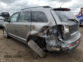 2012 Dodge Journey SXT z VIN 3C4PDCBG3CT213515, wystawiony jako Copart lot #58128845 z przebiegiem 208 152 mil mil oraz Szkoda całkowita • Salvage title. Historia ofert i sprzedaży dostępna na DreamBid. Obrazek 2.