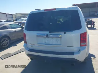 2012 Honda Pilot Touring with VIN 5FNYF3H91CB020673, listed as a IAAI auction lot 41721836 with 123,607 mi miles and . Bid and sale history available at carsss.com. Image 16.