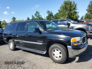 2000 GMC Yukon XL SLT with VIN 3GKFK16TXYG171619, listed as a Copart auction lot 72924474 with 143,043 mi miles and Salvage Title. Bid and sale history available at carsss.com. Image 4.