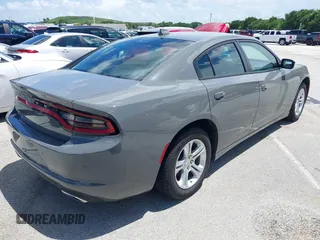 2023 Dodge Charger SXT with VIN 2C3CDXBG5PH638680, listed as a IAAI auction lot 39678284 with 24,364 mi miles. Bid and sale history available at carsss.com. Image 4.