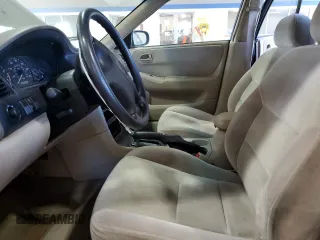 1998 Mazda 626 DX with VIN 1YVGF22C2W5751008, listed as a Copart auction lot 74742174 with 172,980 mi miles and Salvage Title. Bid and sale history available at carsss.com. Image 7.