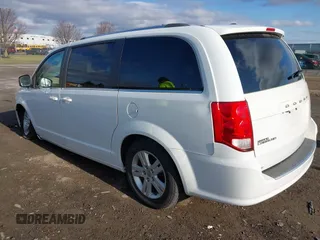 2019 Dodge Grand Caravan SXT with VIN 2C4RDGCG4KR771745, listed as a IAAI auction lot 41859267 with 97,436 mi miles and . Bid and sale history available at DreamBid. Image 3.