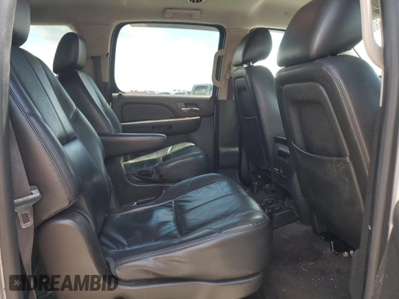 2014 GMC Yukon XL SLT z VIN 1GKS2KE73ER179324, wystawiony jako Copart lot #58002305 z przebiegiem 228 651 mil mil oraz Szkoda całkowita • Salvage title. Historia ofert i sprzedaży dostępna na DreamBid. Obrazek 11.