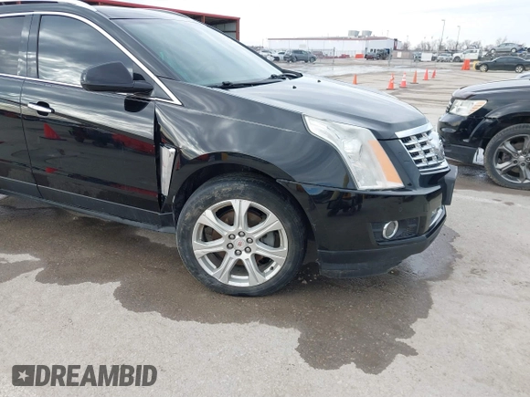 2013 Cadillac SRX Performance Collection with VIN 3GYFNHE34DS595277, listed as a IAAI auction lot 41618126 with 118,141 mi miles. Bid and sale history available at carsss.com. Image 6.