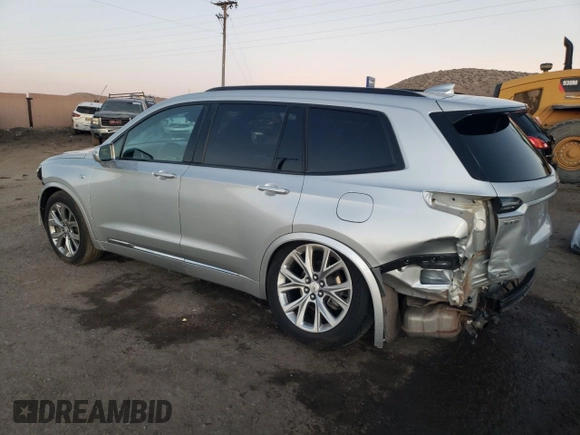 2020 Cadillac XT6 AWD Sport z VIN 1GYKPGRS8LZ216836, wystawiony jako Copart lot #82161014 z przebiegiem 90 883 mil mil oraz Szkody całkowita. Historia ofert i sprzedaży dostępna na DreamBid. Obrazek 2.