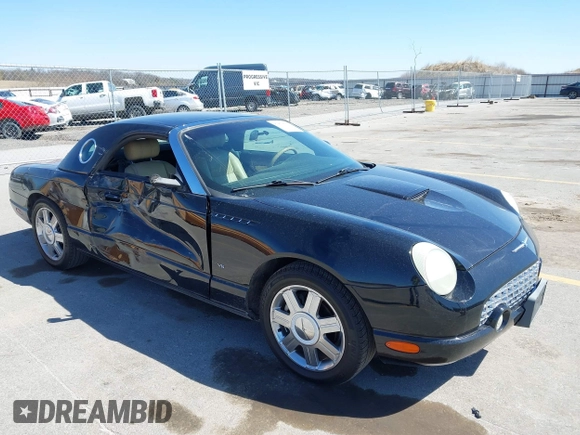 2004 Ford Thunderbird Deluxe z VIN 1FAHP60AX4Y103613, wystawiony jako IAAI lot #41962198 z przebiegiem 81 765 mil mil oraz . Historia ofert i sprzedaży dostępna na DreamBid. Obrazek 1.