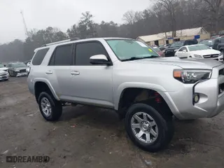 2014 Toyota 4Runner Limited with VIN JTEBU5JR5E5198734, listed as a IAAI auction lot 41513562 with 322,459 mi miles. Bid and sale history available at carsss.com. Image 13.