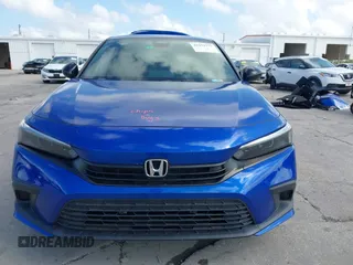 2023 Honda Civic Sedan Sport with VIN 2HGFE2F56PH502772, listed as a IAAI auction lot 41932777 with 16,935 mi miles. Bid and sale history available at carsss.com. Image 13.