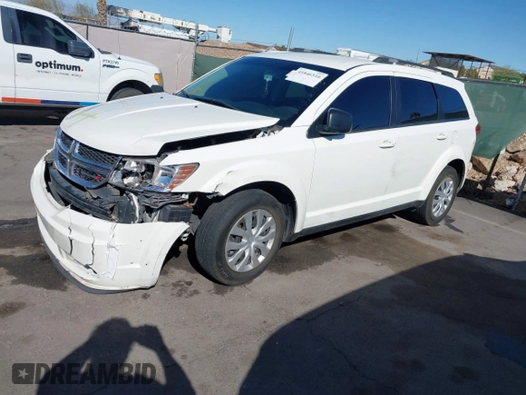 2014 Dodge Journey American Value Pkg with VIN 3C4PDCAB5ET230096, listed as a IAAI auction lot 41846510 with 178,397 mi miles. Bid and sale history available at carsss.com. Image 2.