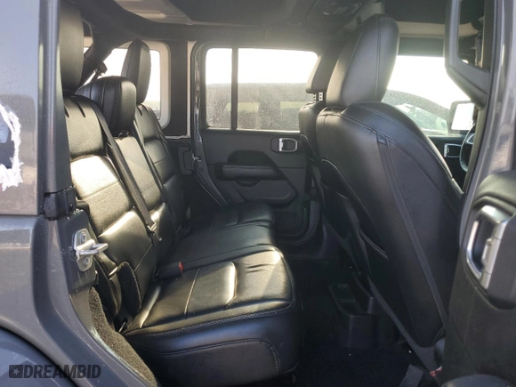 2020 Jeep Wrangler Unlimited Sahara with VIN 1C4HJXENXLW105210, listed as a Copart auction lot 79345214 with 74,480 mi miles and Salvage Title. Bid and sale history available at carsss.com. Image 11.