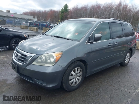 2010 Honda Odyssey EX-L with VIN 5FNRL3H75AB050705, listed as a IAAI auction lot 41953803 with 196,827 mi miles. Bid and sale history available at carsss.com. Image 2.