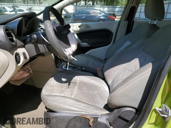 2012 Ford Fiesta SE z VIN 3FADP4BJ7CM164850, wystawiony jako Copart lot #51680925 z przebiegiem 184 884 mil mil oraz Szkoda całkowita • Salvage title. Historia ofert i sprzedaży dostępna na DreamBid. Obrazek 7.