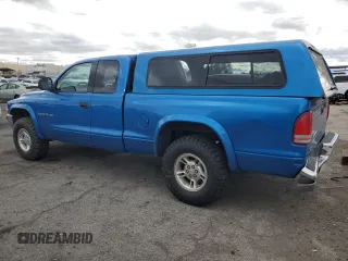 1999 Dodge Dakota SLT with VIN 1B7GG22Y7XS166815, listed as a Copart auction lot 48402125 with 176,458 mi miles and Salvage Title. Bid and sale history available at DreamBid. Image 2.