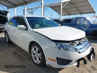 2012 Ford Fusion SE z VIN 3FAHP0HA3CR340751, wystawiony jako IAAI lot #41646355 z przebiegiem 126 978 mil mil oraz . Historia ofert i sprzedaży dostępna na DreamBid. Obrazek 1.