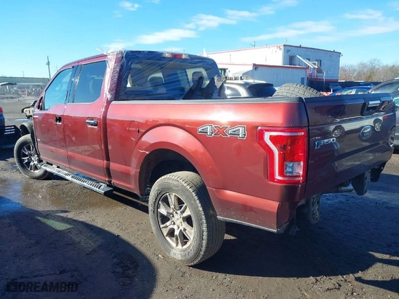 2015 Ford F-150 XLT w/HD Payload Pkg with VIN 1FTFW1EG9FFC44739, listed as a IAAI auction lot 41193582 with 121,169 mi miles. Bid and sale history available at carsss.com. Image 3.