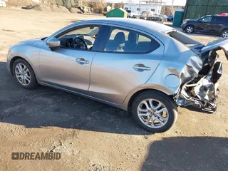 2016 Scion iA with VIN 3MYDLBZV5GY129856, listed as a IAAI auction lot 41624817 with 69,686 mi miles. Bid and sale history available at carsss.com. Image 3.