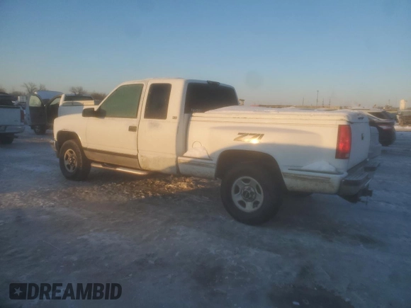 1995 GMC Sierra 1500 z VIN 2GTEK19KXS1504198, wystawiony jako Copart lot #87508215 z przebiegiem 3 210 847 mil mil oraz Szkody całkowita. Historia ofert i sprzedaży dostępna na DreamBid. Obrazek 2.