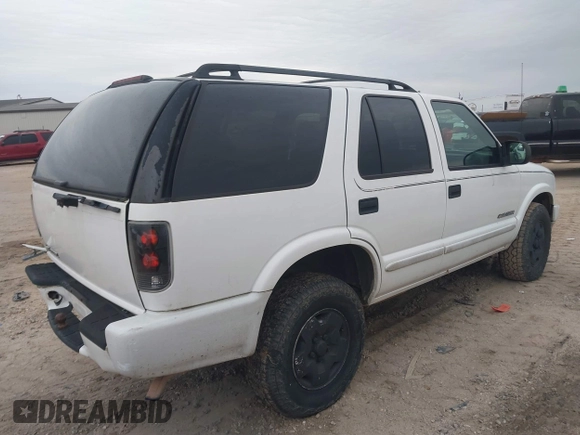 2004 Chevrolet Blazer LS z VIN 1GNDT13X34K157711, wystawiony jako IAAI lot #41282289 z przebiegiem 148 013 mil mil oraz . Historia ofert i sprzedaży dostępna na DreamBid. Obrazek 4.