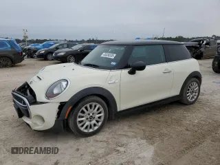 2014 MINI Hardtop S with VIN WMWXM7C51ET985656, listed as a Copart auction lot 45526335 with 106,244 mi miles and Salvage Title. Bid and sale history available at DreamBid. Image 1.