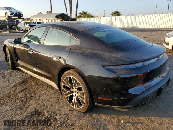 2024 Porsche Taycan with VIN WP0AA2Y10RSA10283, listed as a Copart auction lot 82637484 with 3,036 mi miles and Salvage title. Bid and sale history available at DreamBid. Image 2.