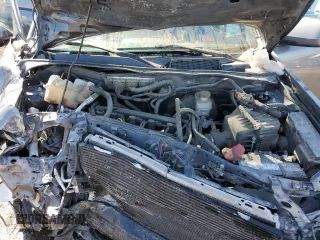 2012 Ford Escape Limited z VIN 1FMCU0E7XCKB19962, wystawiony jako Copart lot #49287765 z przebiegiem 132 747 mil mil oraz Szkoda całkowita • Salvage title. Historia ofert i sprzedaży dostępna na DreamBid. Obrazek 13.