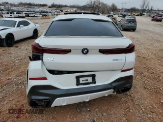 2021 BMW X6 sDrive40i z VIN 5UXCY4C03M9H36510, wystawiony jako Copart lot #86419524 z przebiegiem Nie podano mil oraz Szkody całkowita. Historia ofert i sprzedaży dostępna na DreamBid. Obrazek 6.