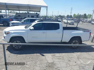 2023 Toyota Tacoma SR5 z VIN 3TMDZ5BN3PM160975, wystawiony jako IAAI lot #42024778 z przebiegiem 41 621 mil mil oraz . Historia ofert i sprzedaży dostępna na DreamBid. Obrazek 13.