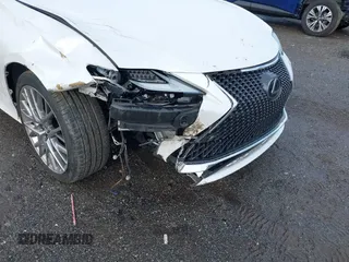 2021 Lexus RC 300 z VIN JTHD85EC7M5006203, wystawiony jako IAAI lot #41833919 z przebiegiem 76 767 mil mil oraz . Historia ofert i sprzedaży dostępna na DreamBid. Obrazek 6.