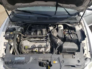 2012 Ford Taurus SEL z VIN 1FAHP2HW4CG129105, wystawiony jako Copart lot #54708445 z przebiegiem 201 450 mil mil oraz Szkoda całkowita • Salvage title. Historia ofert i sprzedaży dostępna na DreamBid. Obrazek 11.